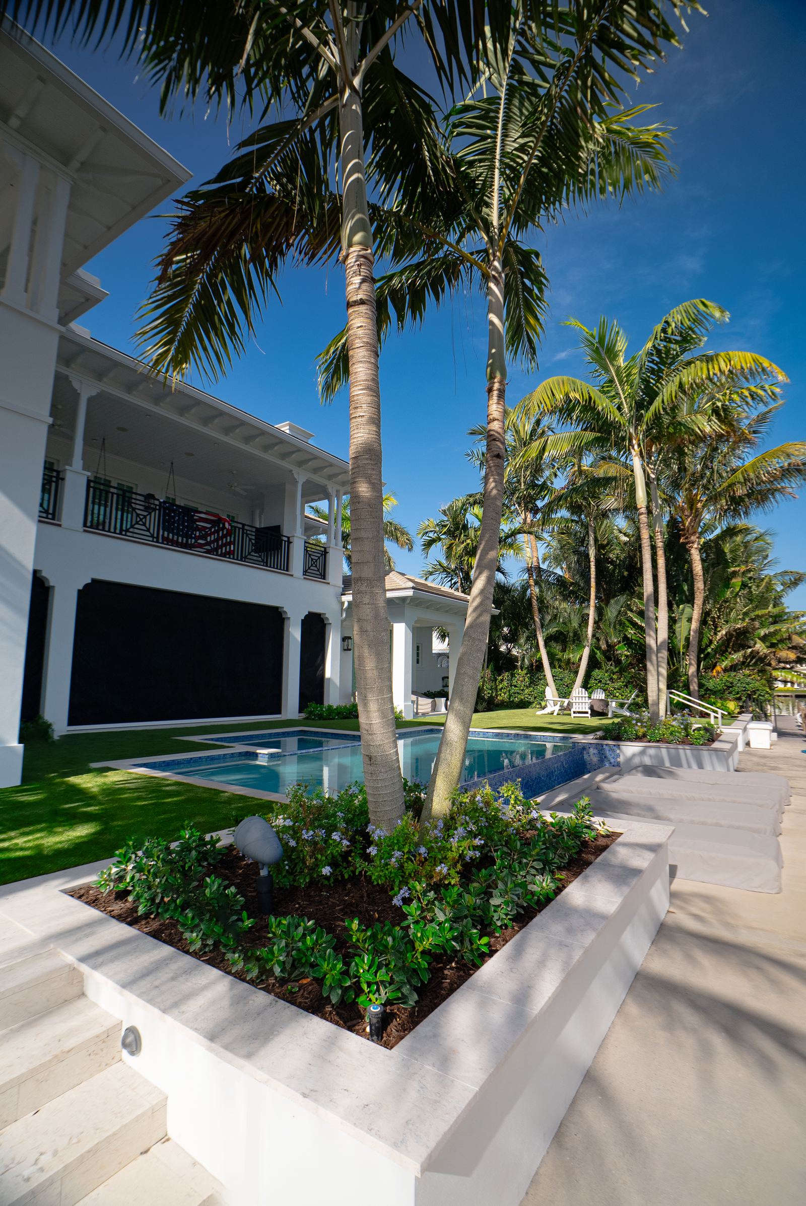 Poolside planting by Delray Landscape